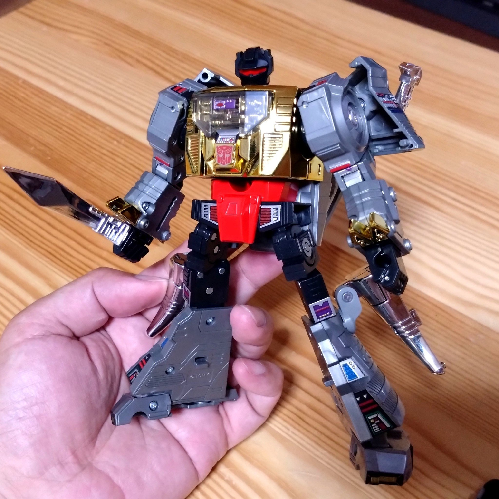 Takara-Tomy-Missing-Link-C-12-Grimlock-In-Hand-Images-24.png